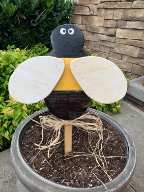 Handmade outdoor bee with wire antenna.  Suitable for outdoor use.  Handmade from reclaimed wood.  