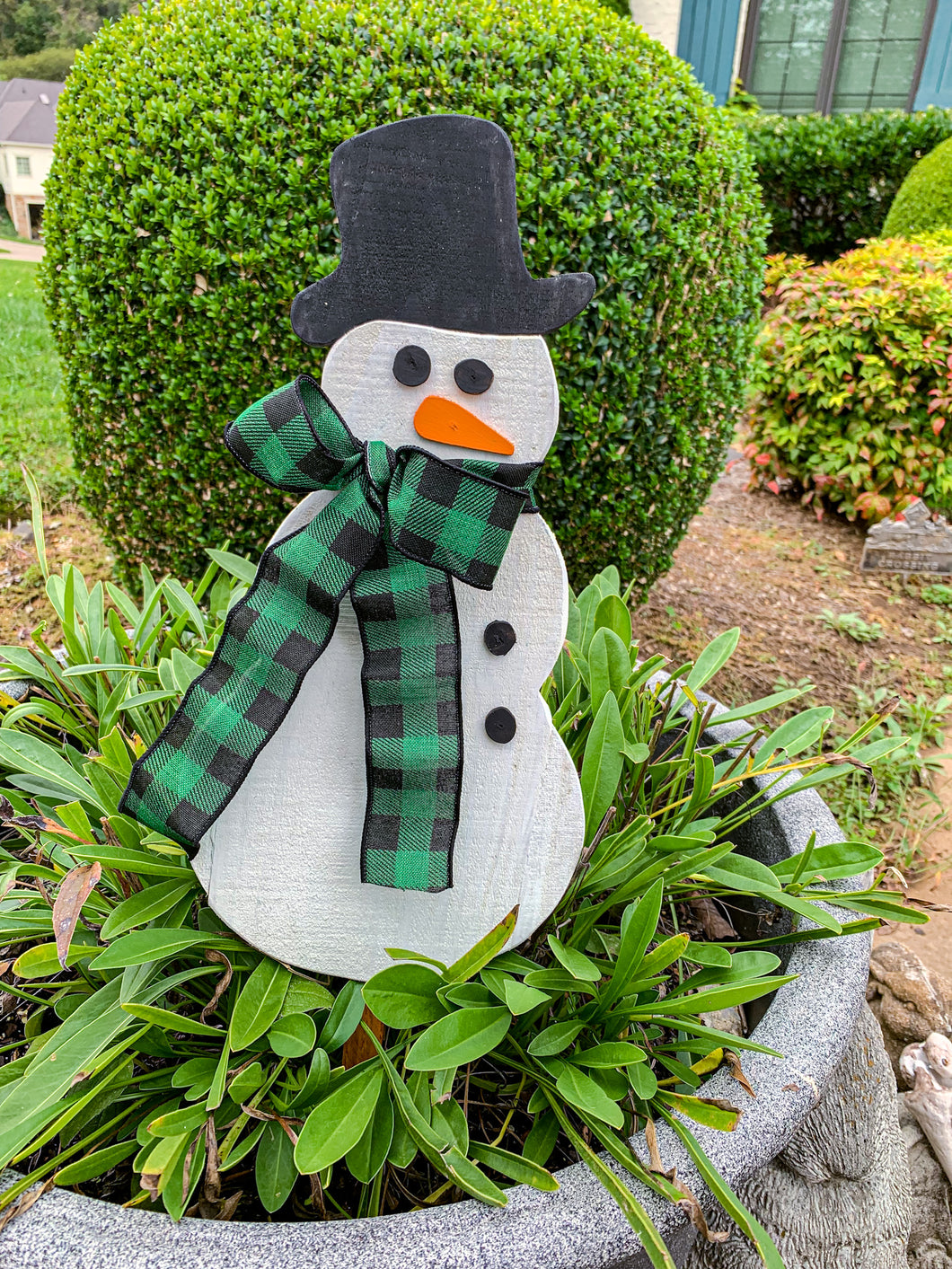 Outdoor Snow Man with Green Plaid Muffler